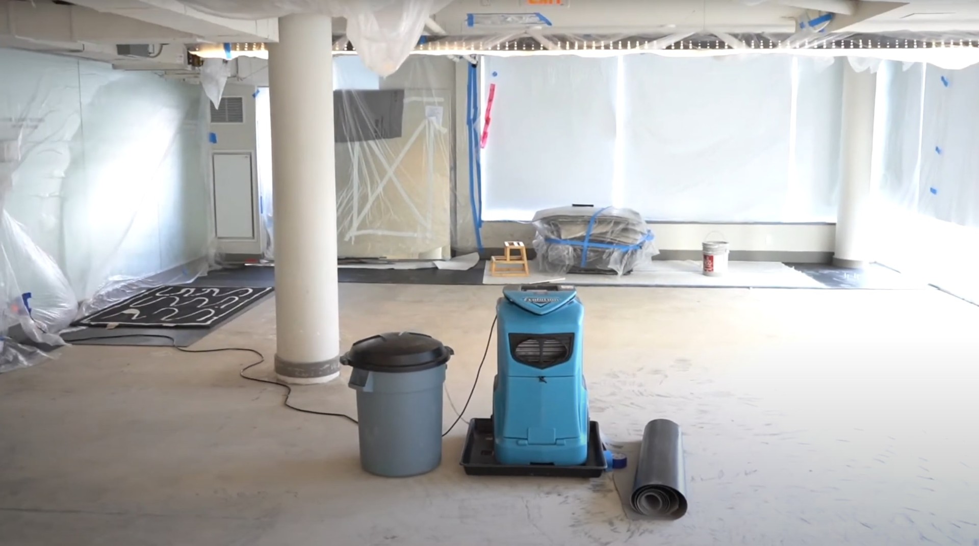 Professional water damage restoration work environment showing advanced equipment and professional setup